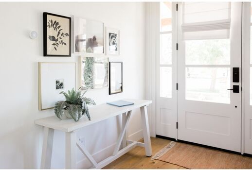 white table and white door
